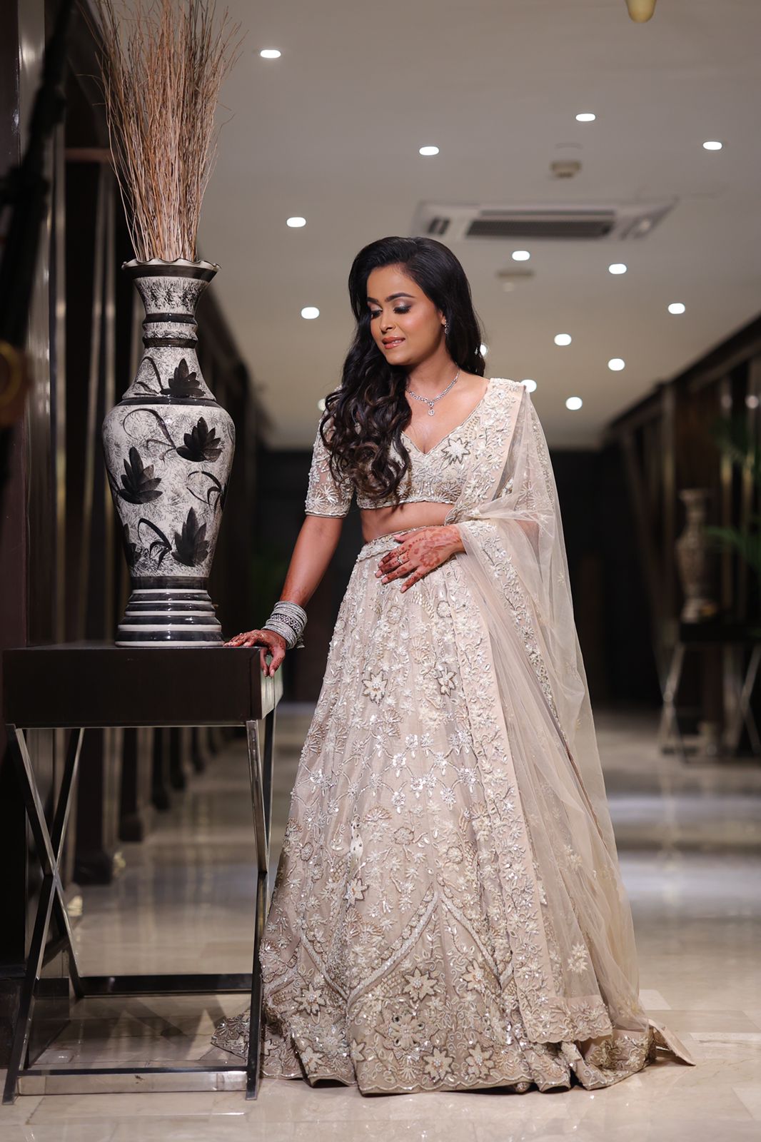 BRIDE: SAKSHI SINGHAL IN OUR AAYAT IVORY LEHENGA SET