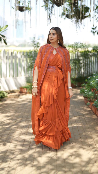 Summiyya Patni in Rust Cape Drape Sari